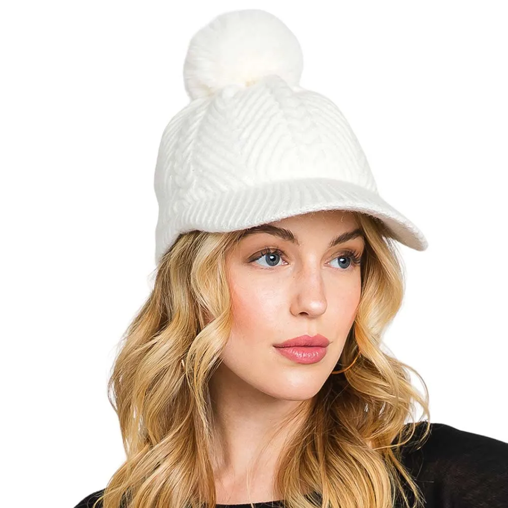 Knitted Cap with Chevron Pattern and Faux Fur Pom Pom.